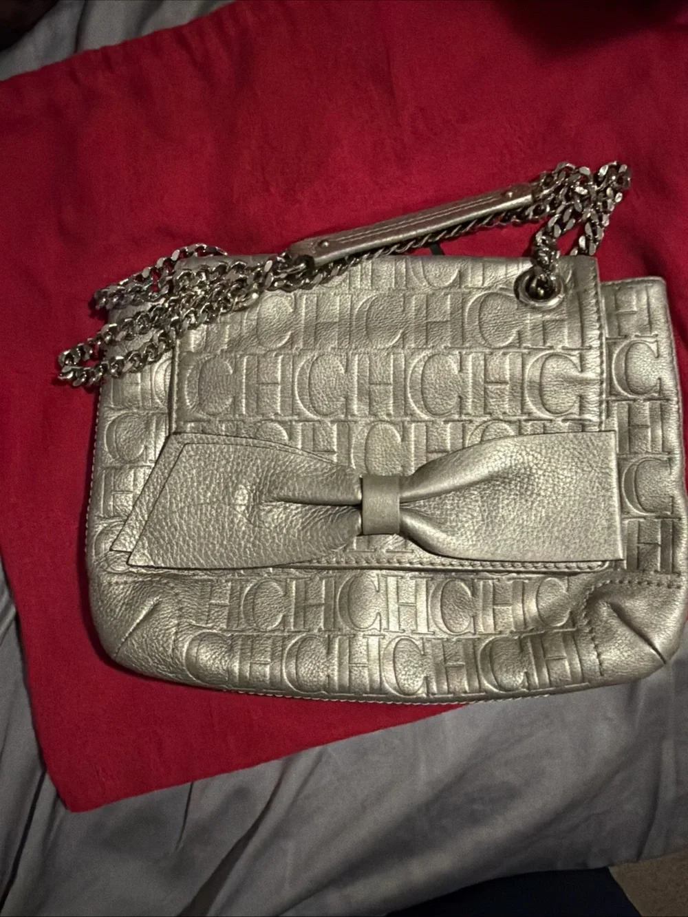 Carolina Herrera Silver Embossed CH Bow Crossbody